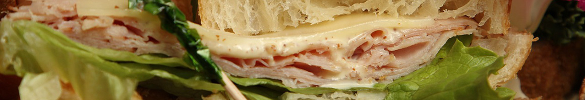 Eating Sandwich at Tubby's Sub Shop restaurant in Clawson, MI.